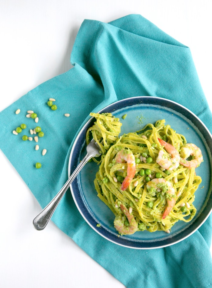 Looking for a light dairy-free pasta recipe to enjoy all spring long? Look no further! This quick Pea Pesto Pasta with Prawns is sure to become a favorite meal this season! Recipe by The Petite Cook