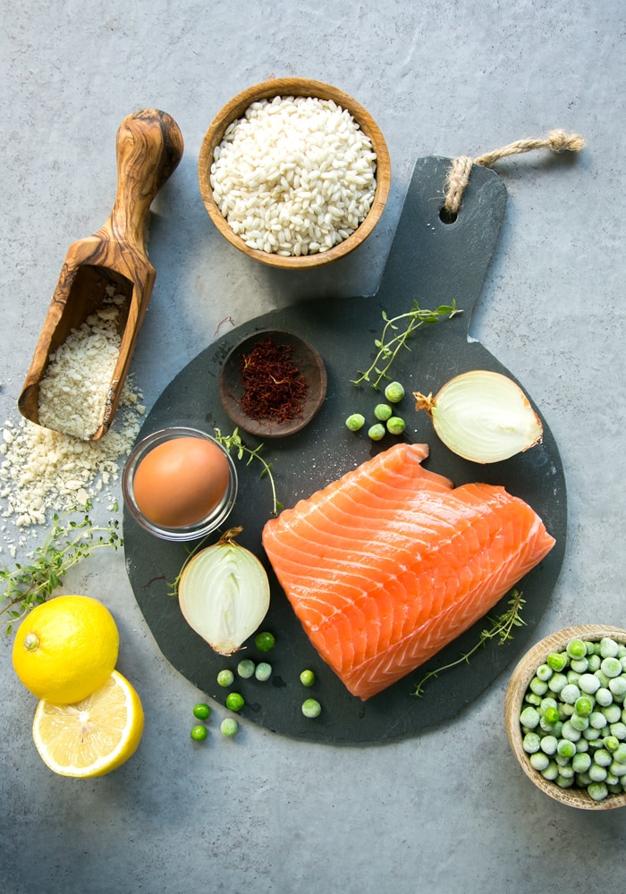 The ingredients list is short, and made of simple ingredients such as: fresh salmon, frozen peas, risotto rice, panko breadcrumbs, eggs, onion, lemon zest, saffron and thyme.