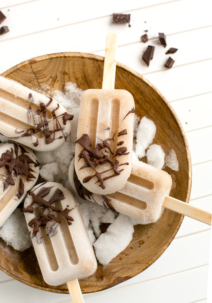 Healthy vegan Banana Chocolate Popsicles made with just 3 simple ingredients. Naturally dairy-free and gluten-free, they make the perfect summer treat to share! Recipe by The Petite Cook