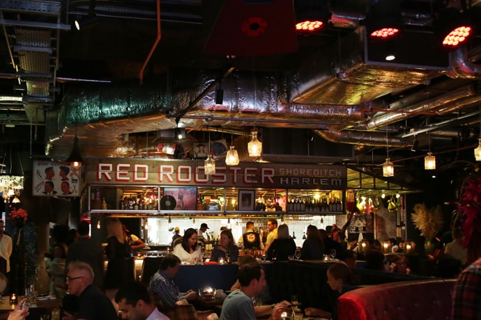 red rooster restaurant picture of the bar with people