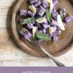 Purple potato gnocchi with sage butter and parmesan shavings sauce. Image for Pinterest.