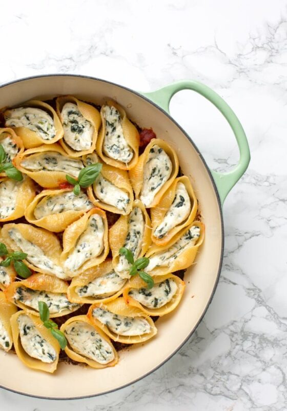 These classic Italian Spinach and Ricotta Stuffed Pasta Shells have all it takes to become a family favourite. Awesomely vegetarian, they're easy and quick enough to make for a weeknight dinner, but also pretty enough to serve at dinner parties and get-togethers. Recipe by The Petite Cook