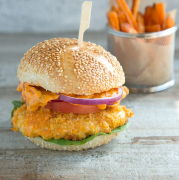 buttermilk oven fried burger with spicy mayo, served with sweet potato fries