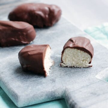 vegan bounty bars on marble board, light blue napkin in the background