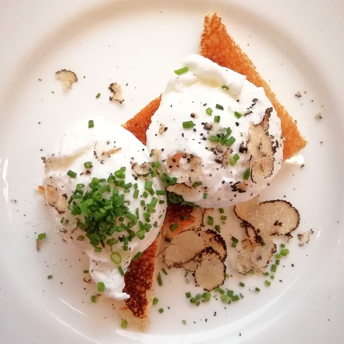 poached aggs with truffle on top served at Th Bank brasserie at Park Hyatt Vienna