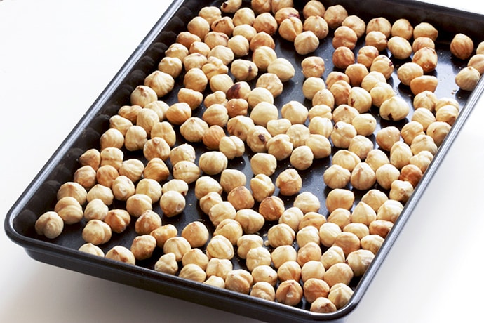 recipe process shot 1: hazelnuts on roasting tray