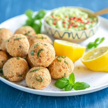 Baked salmon meatballs with avocado dip.