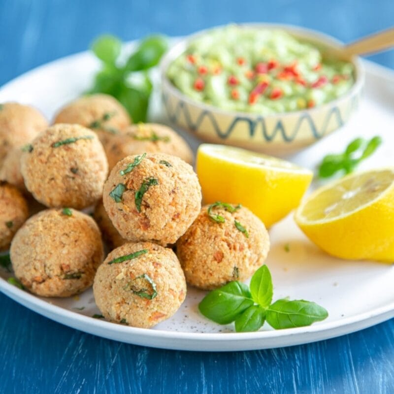 Baked salmon meatballs with avocado dip.