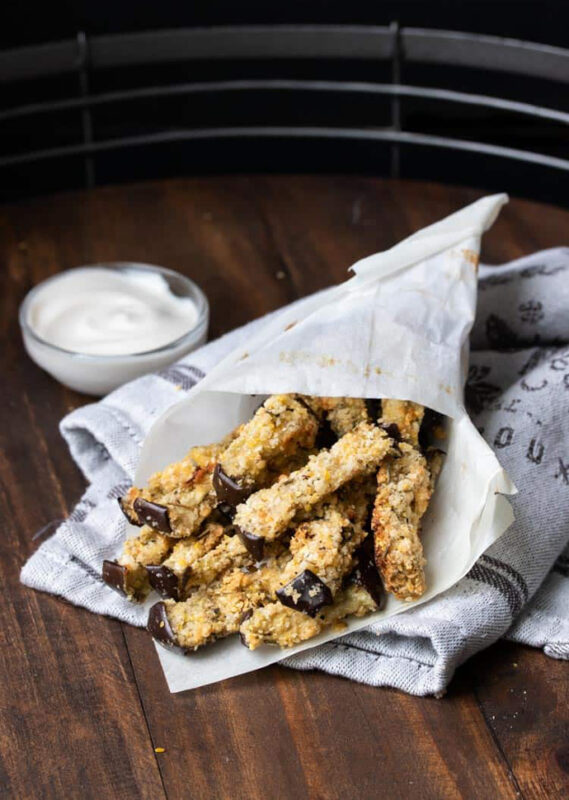 eggplant fries in a paper cone, served with sauce on the side