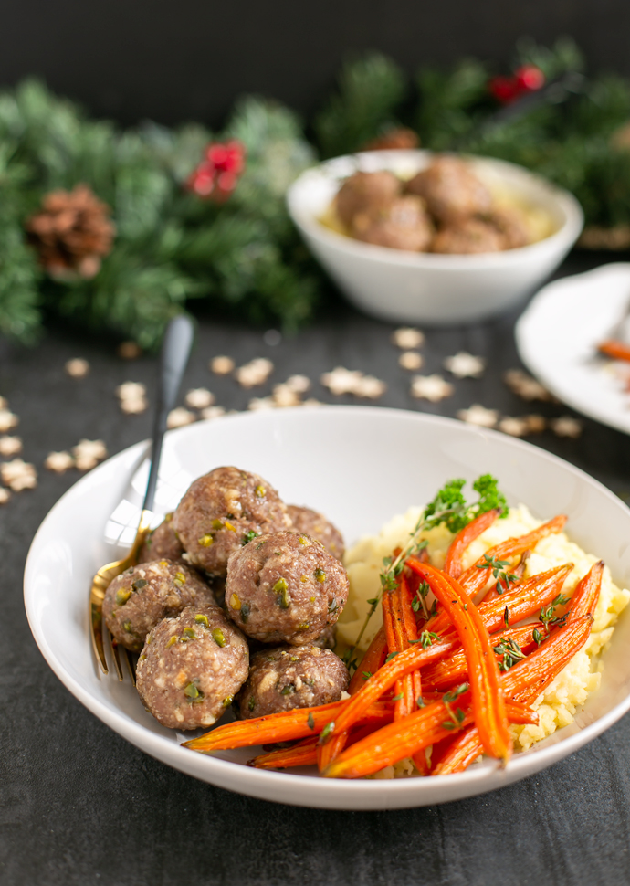 pistachio lamb meatballs servedd with glazed carrots, and mashed potatoes