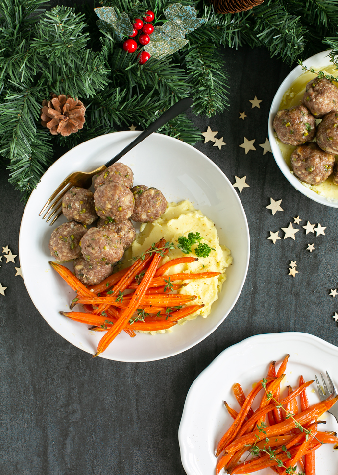 pistachio lamb meatballs servedd with glazed carrots, and mashed potatoes