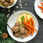 pistachio lamb meatballs servedd with glazed carrots, and mashed potatoes