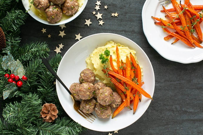 pistachio lamb meatballs servedd with glazed carrots, and mashed potatoes