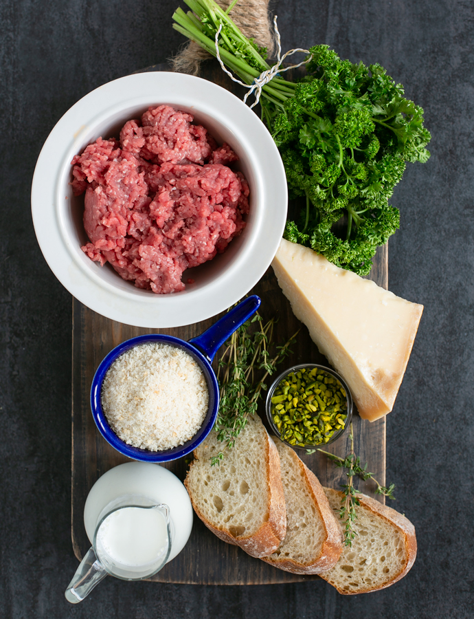 recipe ingredients: minced lamb, parsley, parmesan cheese, thyme leaves, bread slices, milk, panko breadcrumbs, chopped pistachios