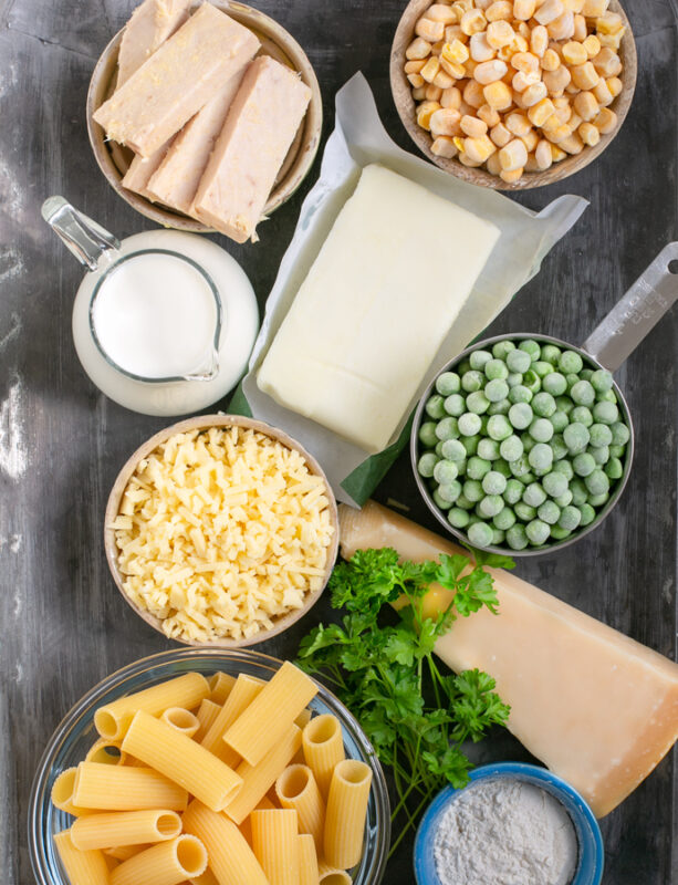 ingredients for the recipe: tuna chunks, sweetcorn, peas, butter, parmesan cheese, milk, strong cheddar, rigatoni pasta, flour.