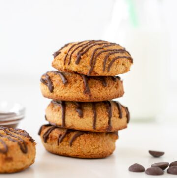 2-ingredient cookies with a glass of milk on the side