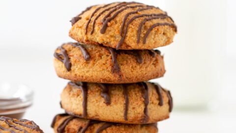 2-ingredient cookies with a glass of milk on the side