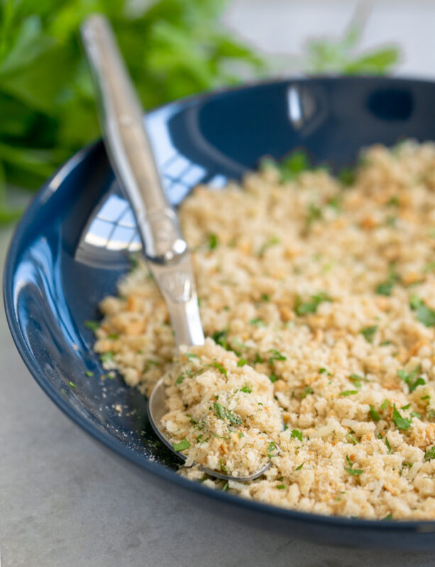 italian pangrattato in a bowl with a spoon.