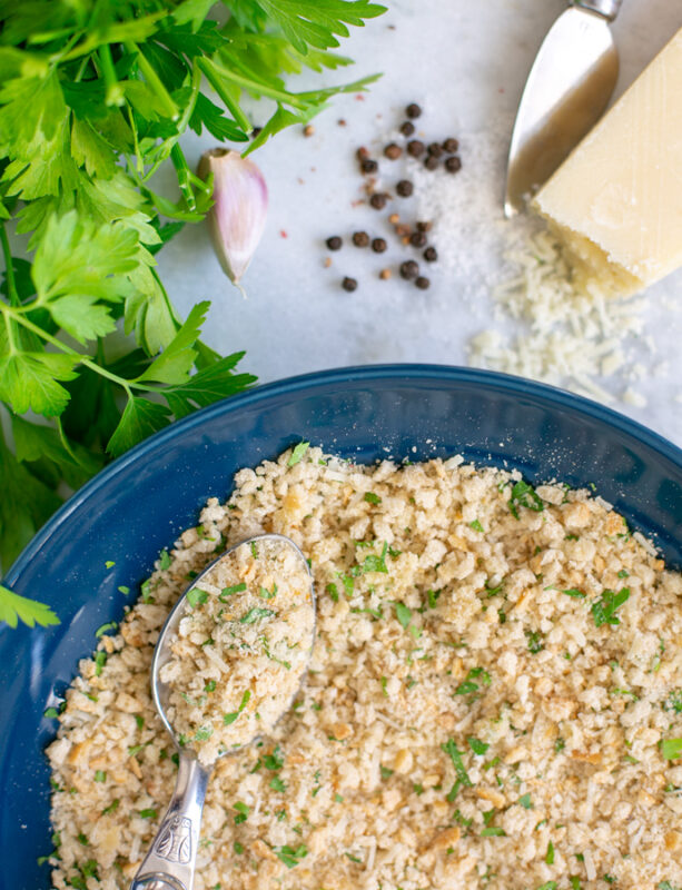 homemade italian breadcrumbs in a bowl, ingredients in the background