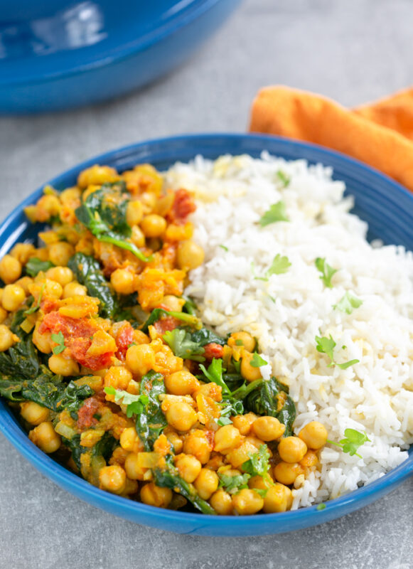 spinach and chickpea curry served with rice