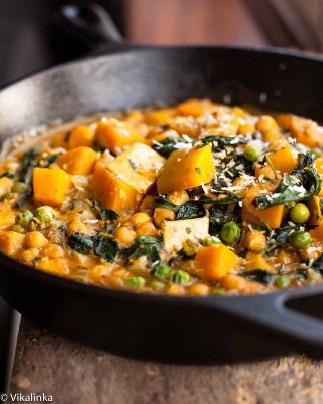 chickpea butternut squash curry in a cast iron skillet.