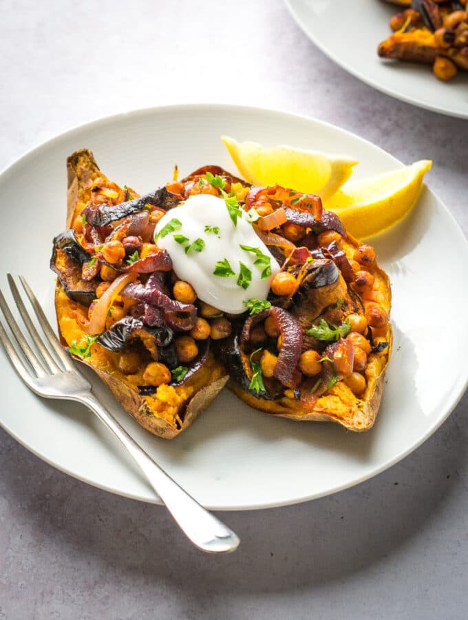 harrisa baked aubergine and chickpea stuffed sweet potato.