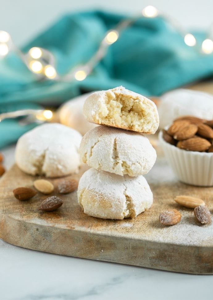 italian amaretti cookies coated in powdered sugar.