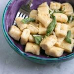 homemade ricotta gnocchi served with butter and sage.