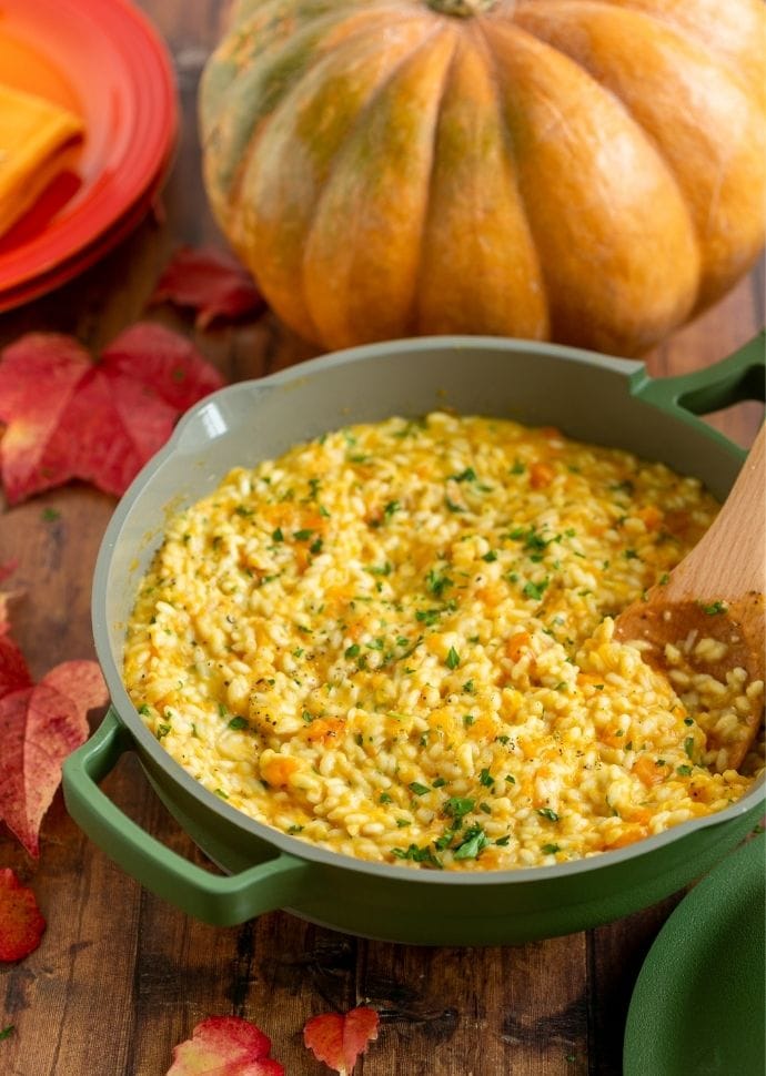 traditional pumpkin risotto served in a large pan.