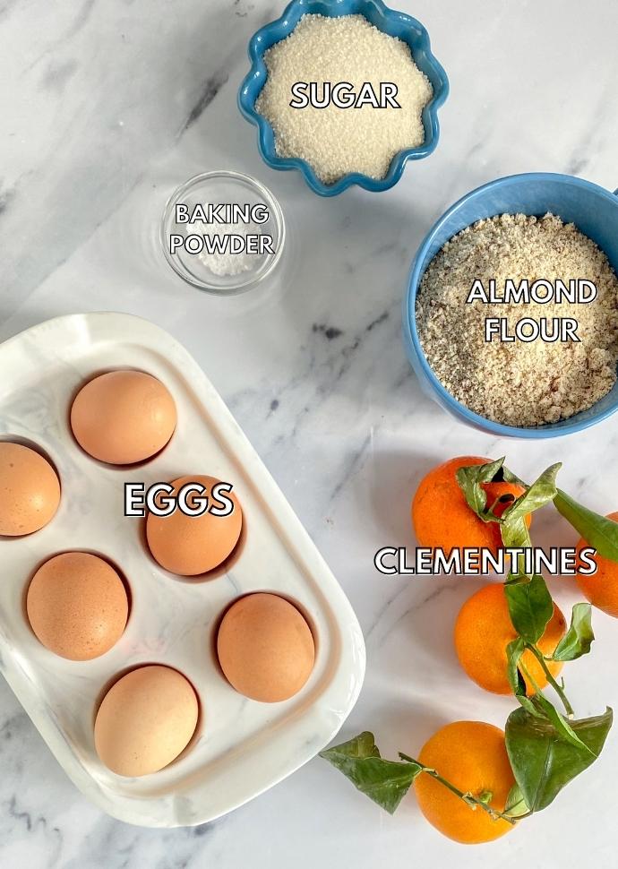 recipe ingredients: eggs, almond flour, baking powder, clementines, sugar.