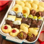 italian butter cookies with various toppings and decorations. Image with text for Pinterest.
