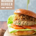 gluten-free mushroom burger topped with caramelized onions, tomatoes and lettuce.