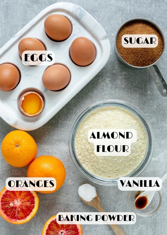 blood orange cake ingredients: eggs, sugar, almond flour, blood oranges, vanilla, baking powder.