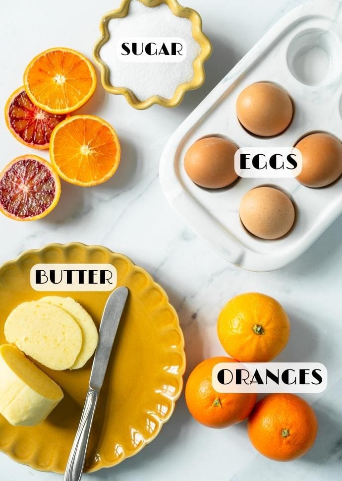 orange curd recipe ingredients: eggs, sugar, oranges and butter.