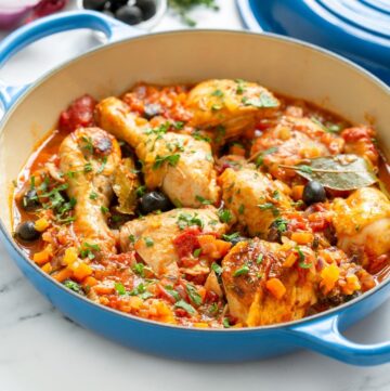 pollo alla cacciatora in a casserole dish.