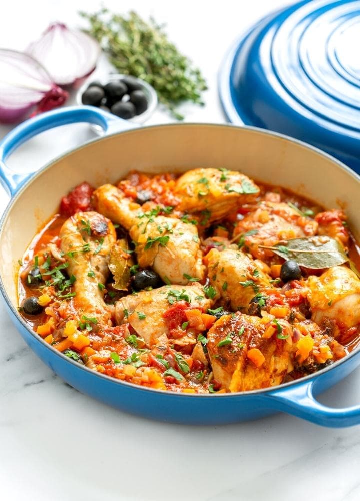 pollo alla cacciatora in a casserole dish.