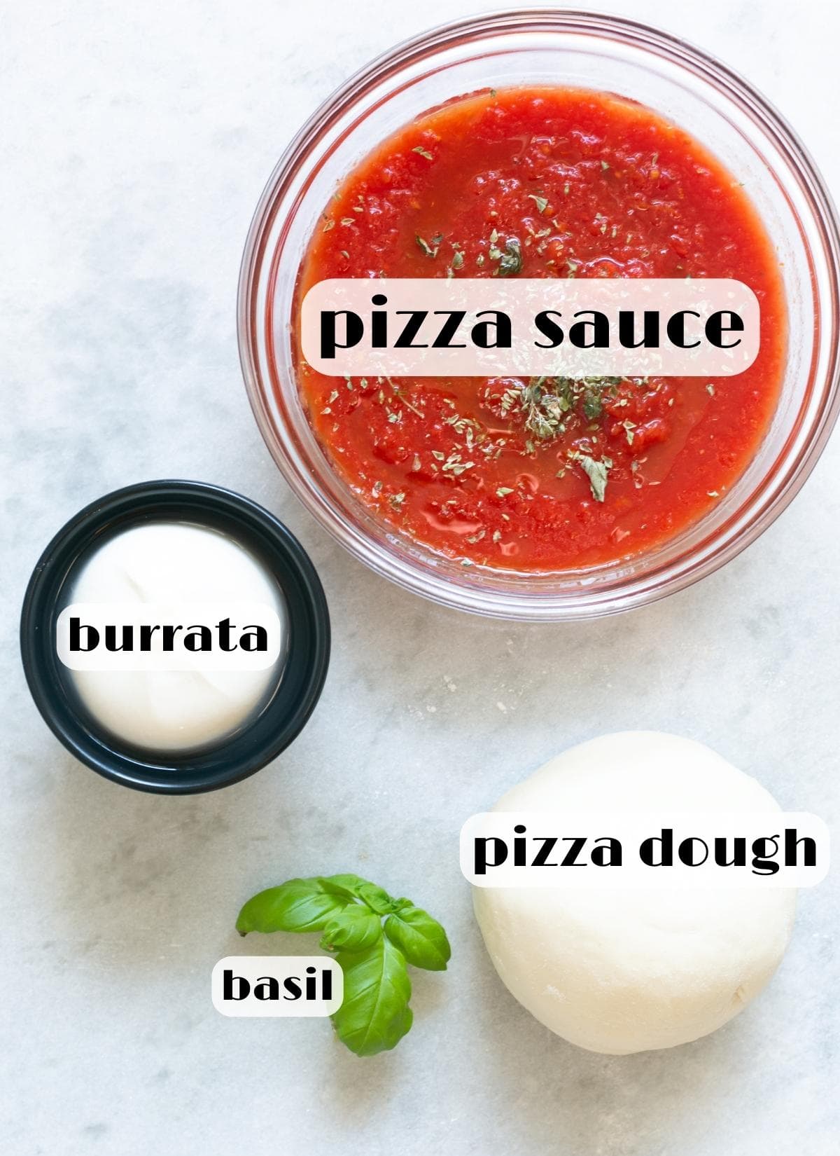 air fryer pizza ingredients: pizza dough, pizza sauce, burrata cheese, basil leaves.