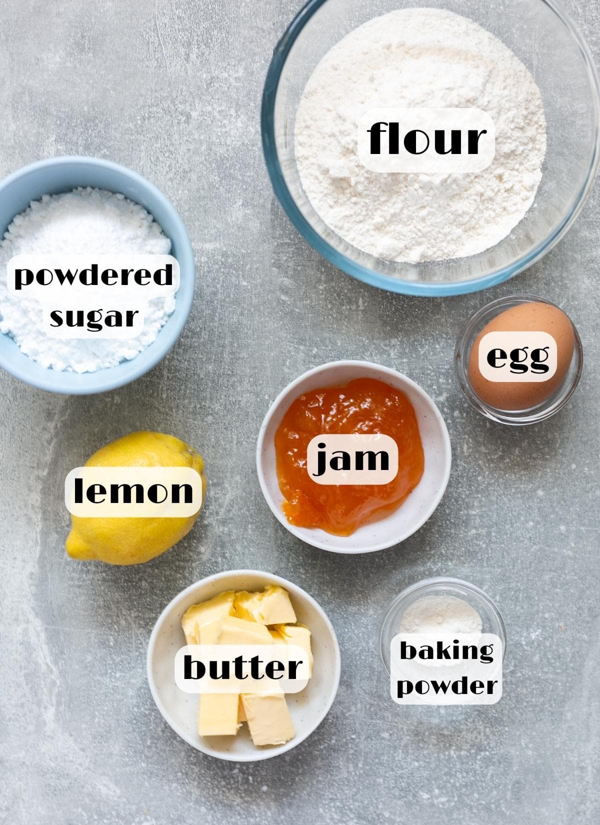 pizzicati cookies ingredients: butter, flour, lemon, egg, baking powder, powdered sugar, jam.