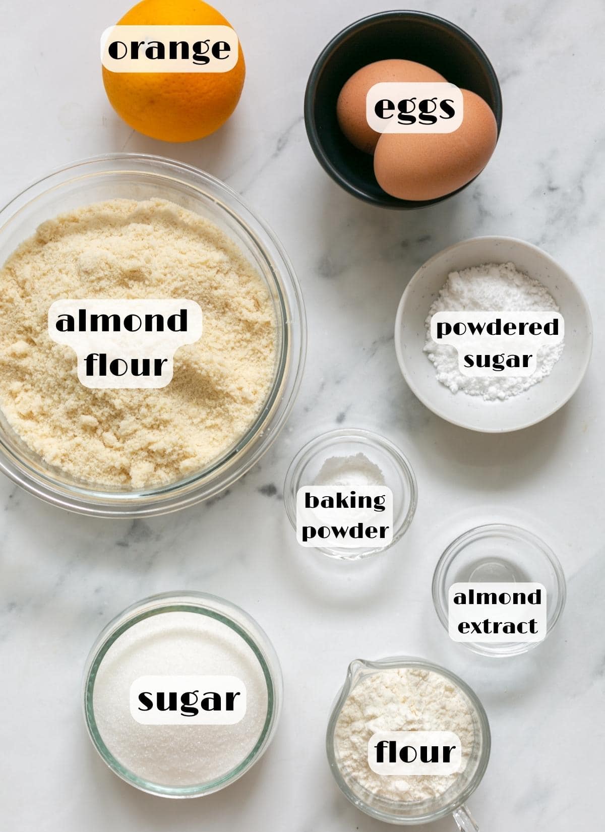 ricciarelli ingredients: almond flour, eggs, flour, sugar, icing sugar, baking powder, orange.