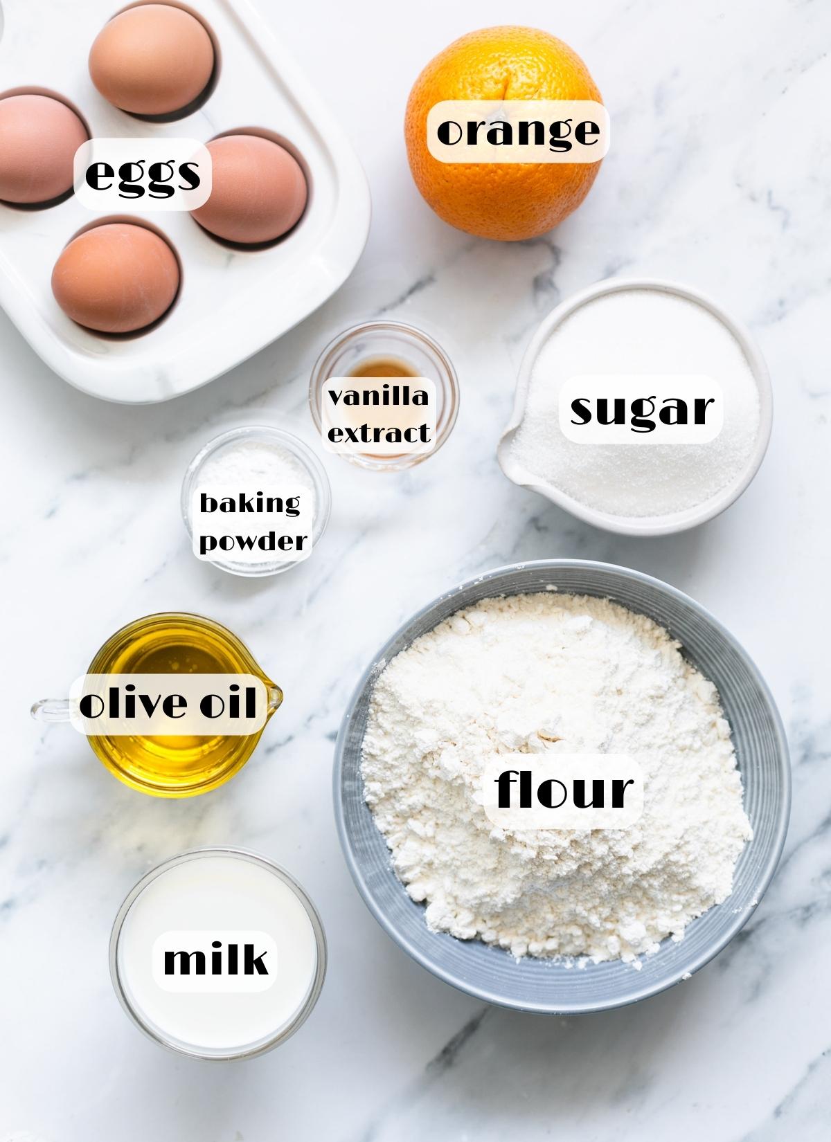 ciambellone ingredients: flour, sugar, orange, eggs, olive oil, milk, baking powder, vanilla extract.