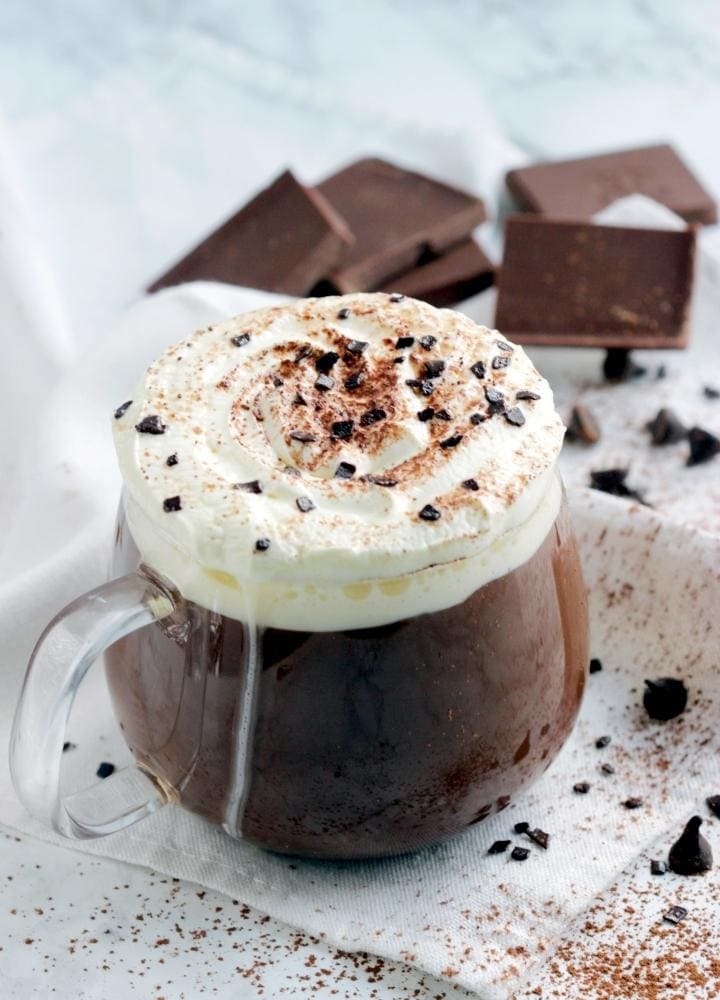 thick italian hot chocolate topped with whipped cream.