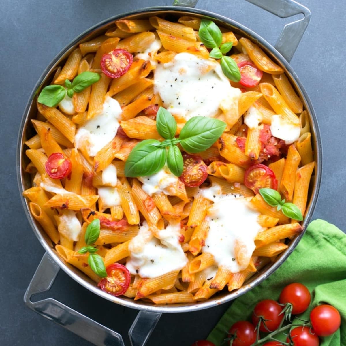 caprese pasta bake with tomato and mozzarella.