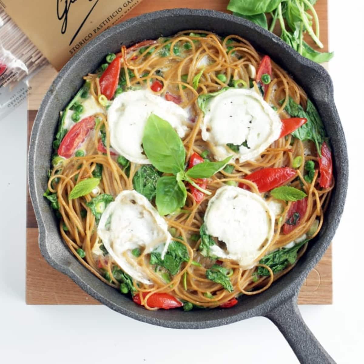 pasta frittata with mozzarella and tomatoes.