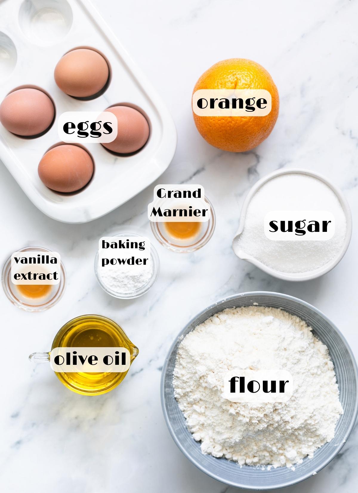 Italian hangover cake ingredients: flour, eggs, sugar, Grand Marnier, orange, olive oil, vanilla, baking powder.