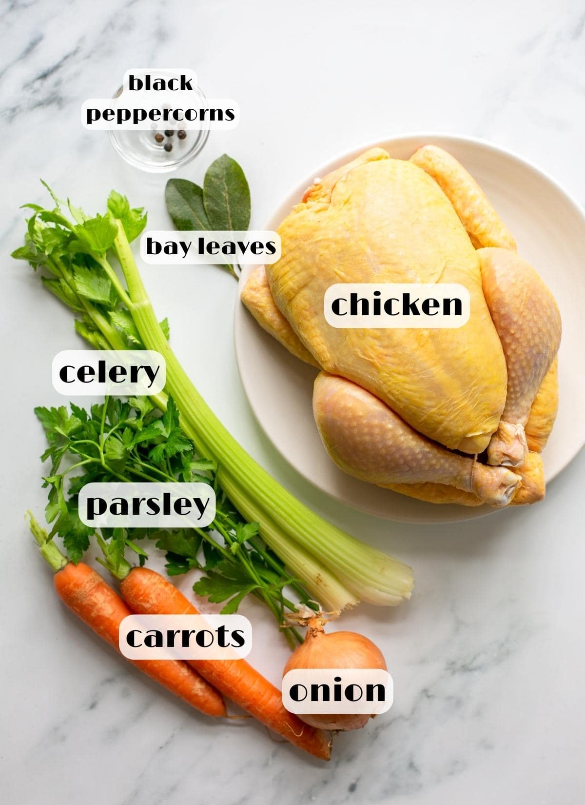 brodo di pollo ingredients: chicken, celery, parsley, carrots, onion, black peppercorns and bay leaves.