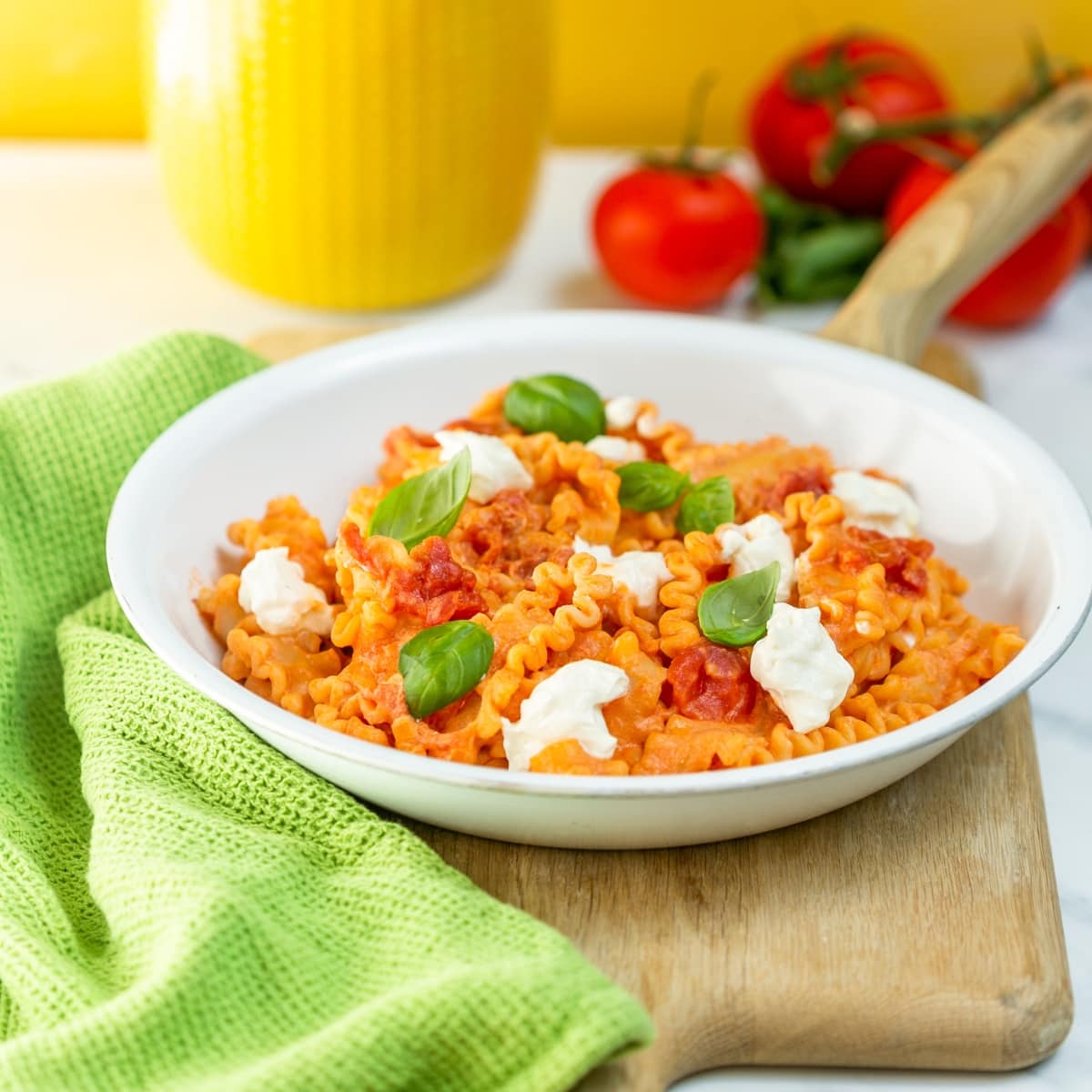 Mafalda pasta with napoletana sauce made with ricotta cheese and tomatoes.