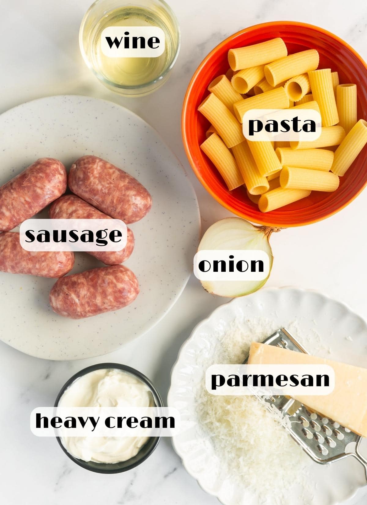 pasta alla norcina ingredients: sausage, pasta, heavy cream, pecorino cheese, onion, wine.