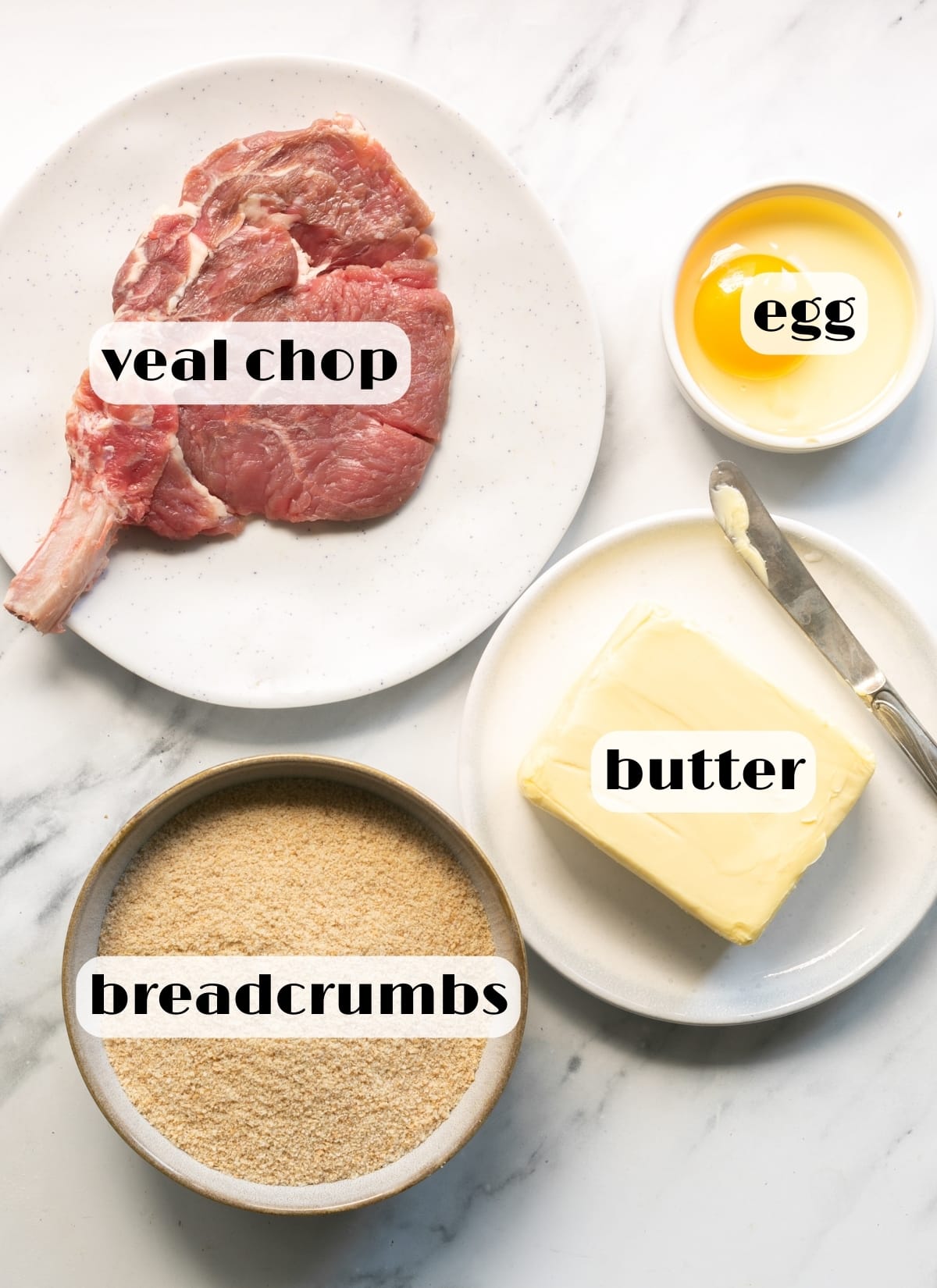 veal milanese ingredients: veal chop, breadcrumbs, butter, egg.