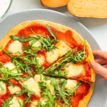 sweet potato pizza, topped with marinara sauce, mozzarella and arugula.