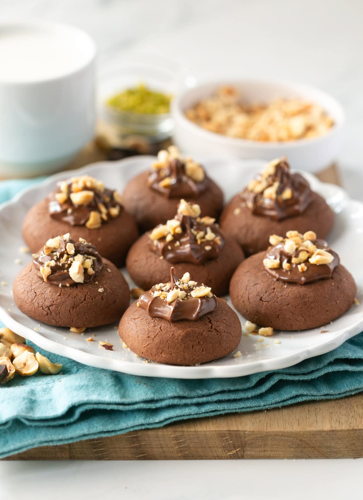 Thumbprint cookies with nutella and hazelnuts.